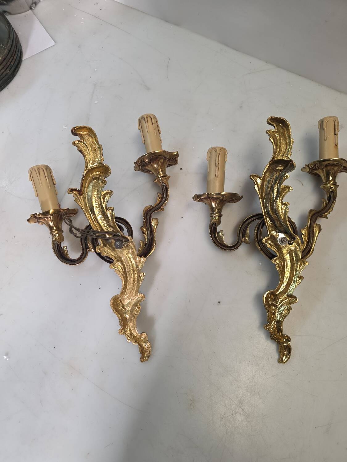 Pair of Louis XV style bronze wall sconces