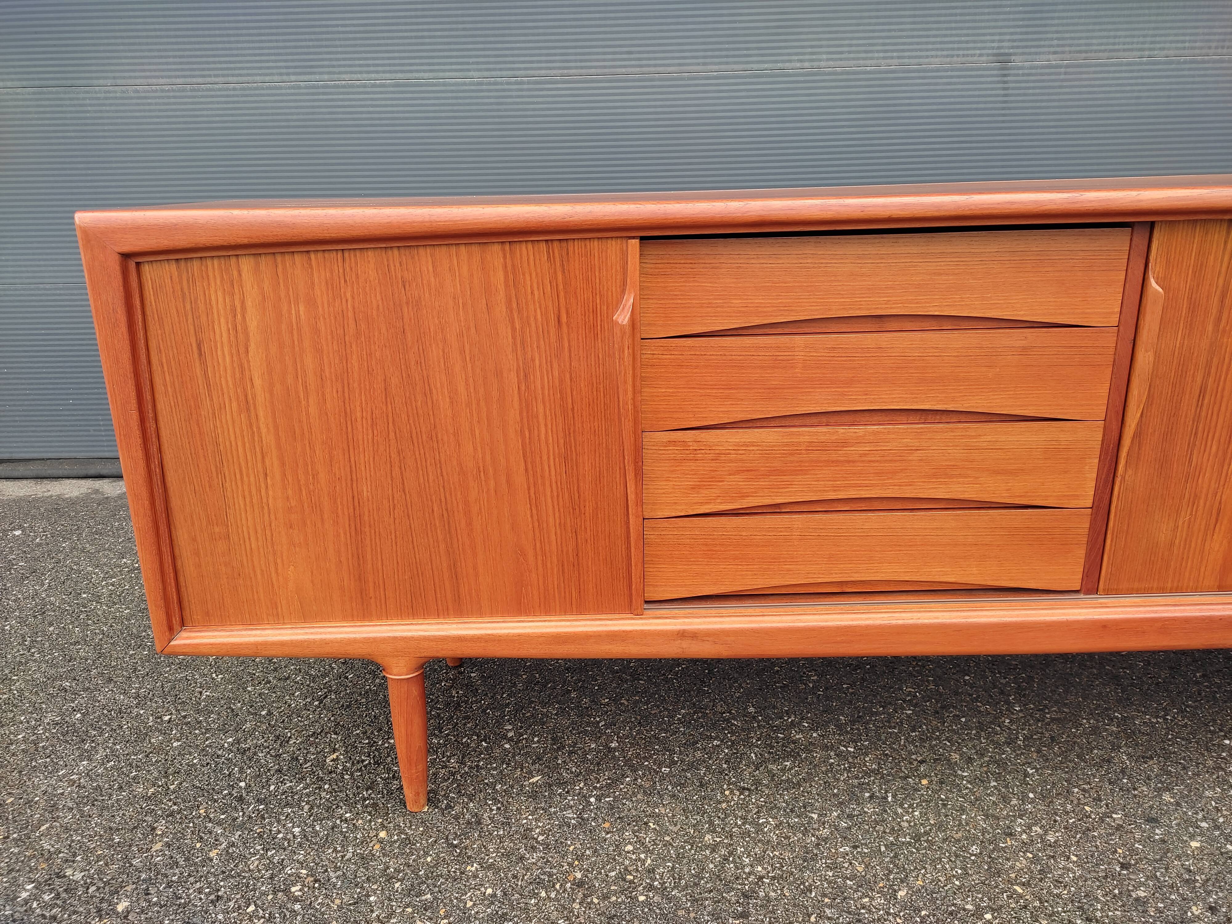 Scandinavian teak row by Axel Christensen for ACO Mobler