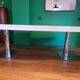 Ligne Roset table in glossy white lacquer, chrome legs, 2 extensions.