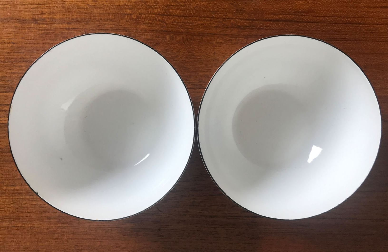 Enamelled metal bowls by Kaj Franck for Arabia 1950s