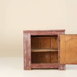 Rustic Parisian cabinet in pine wood with old burgundy paint layers, ca. 18