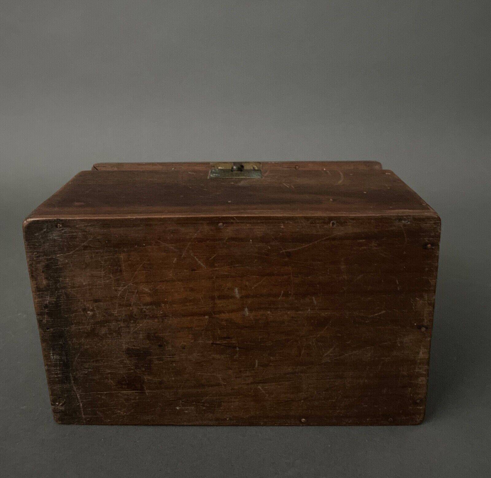 Two reel spools in their original 1900 box