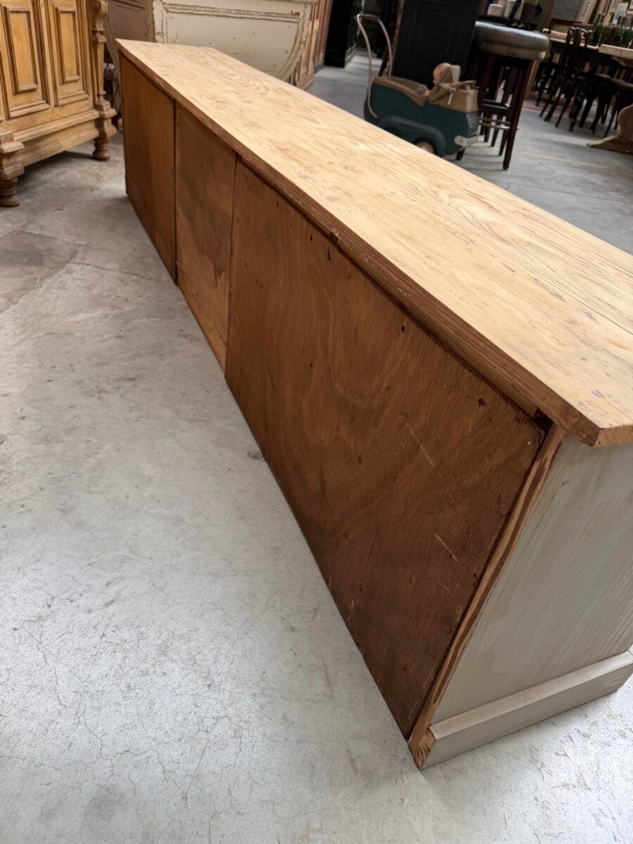 Old workshop furniture transformed into a TV unit.
