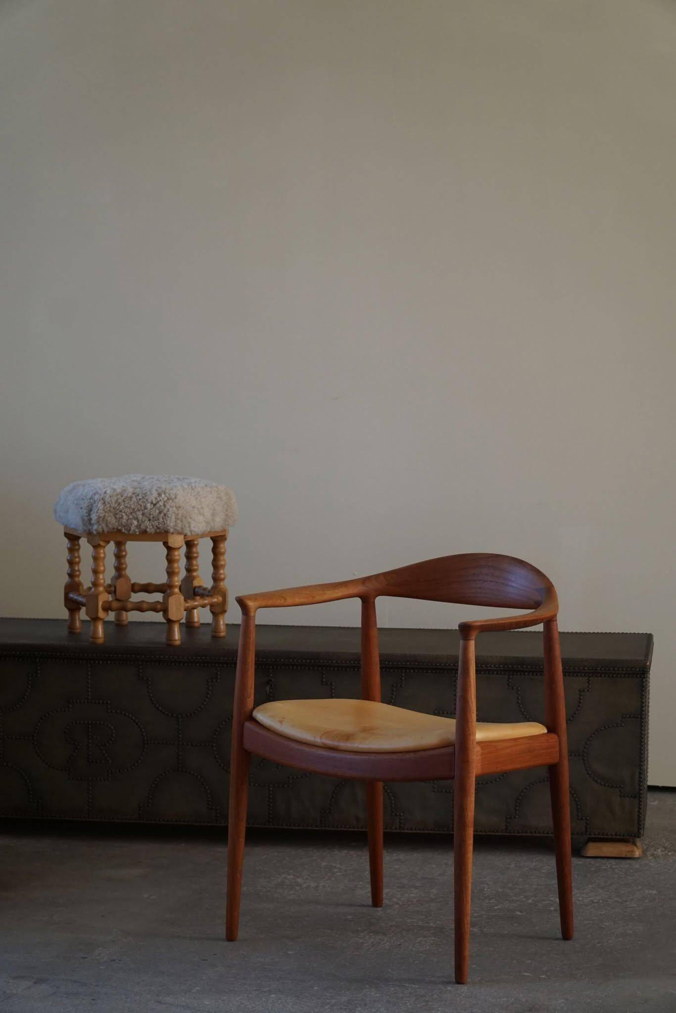 Hans J. Wegner, Teak and leather armchair, model "The Chair" JH501, 1950s