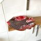 Enamelled ceramic fish cup