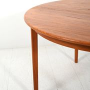 Round extendable teak table by Svante Skogh