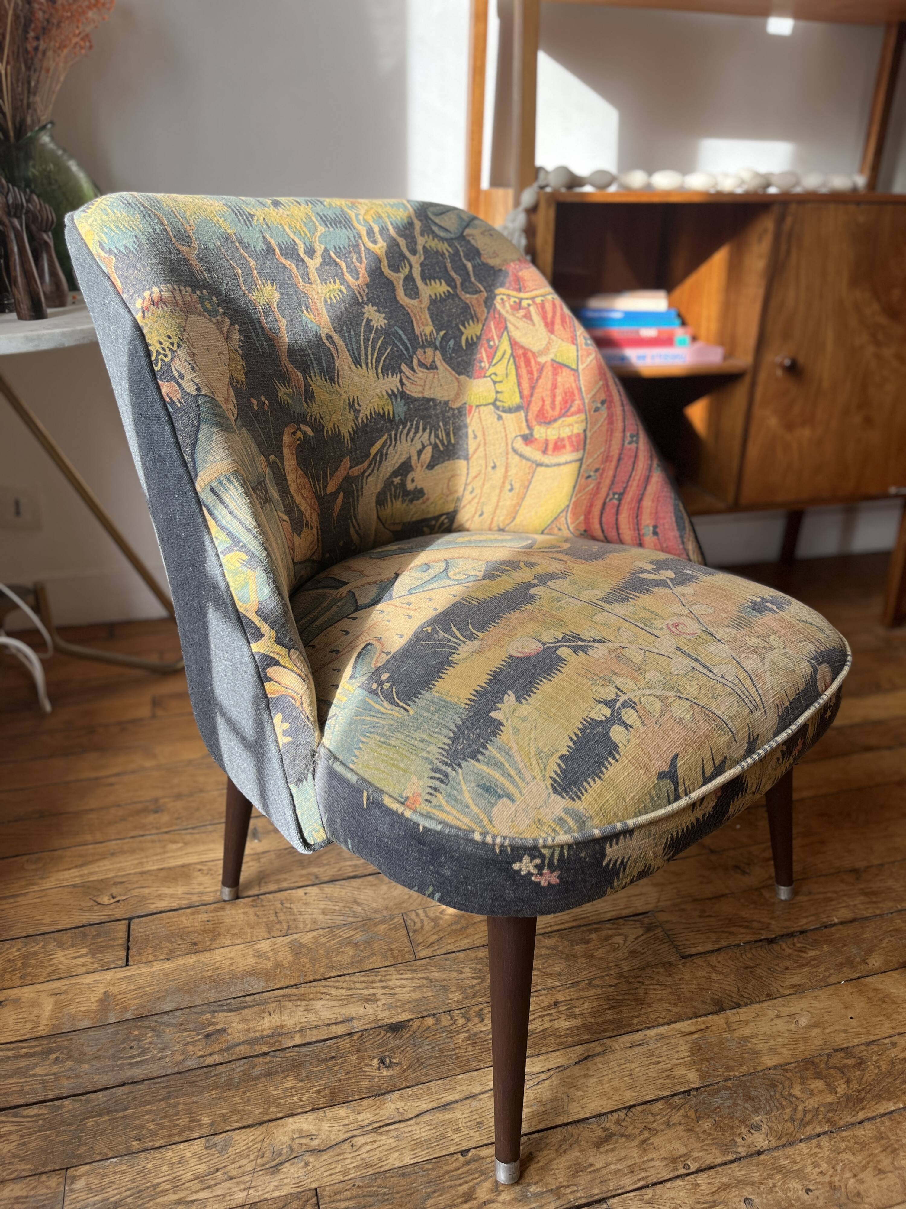 J. Tenreiro, Brazil. Concha armchair with tapered legs, Cluny tapestry 1400.