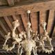 Florentine chandelier in carved wood with polychrome patina.