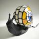 Tiffany-style lamp in the shape of a snail.
