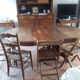 Old table slightly oval cherry tree with central foot with 2 extensions