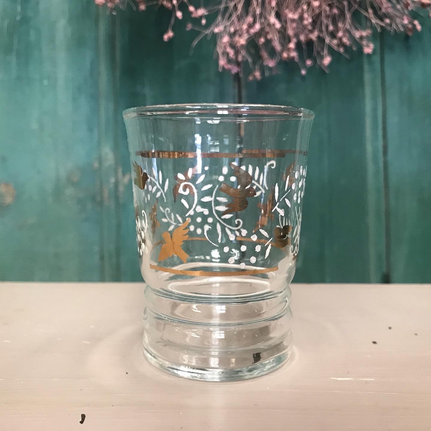 Six glasses old flowers and birds