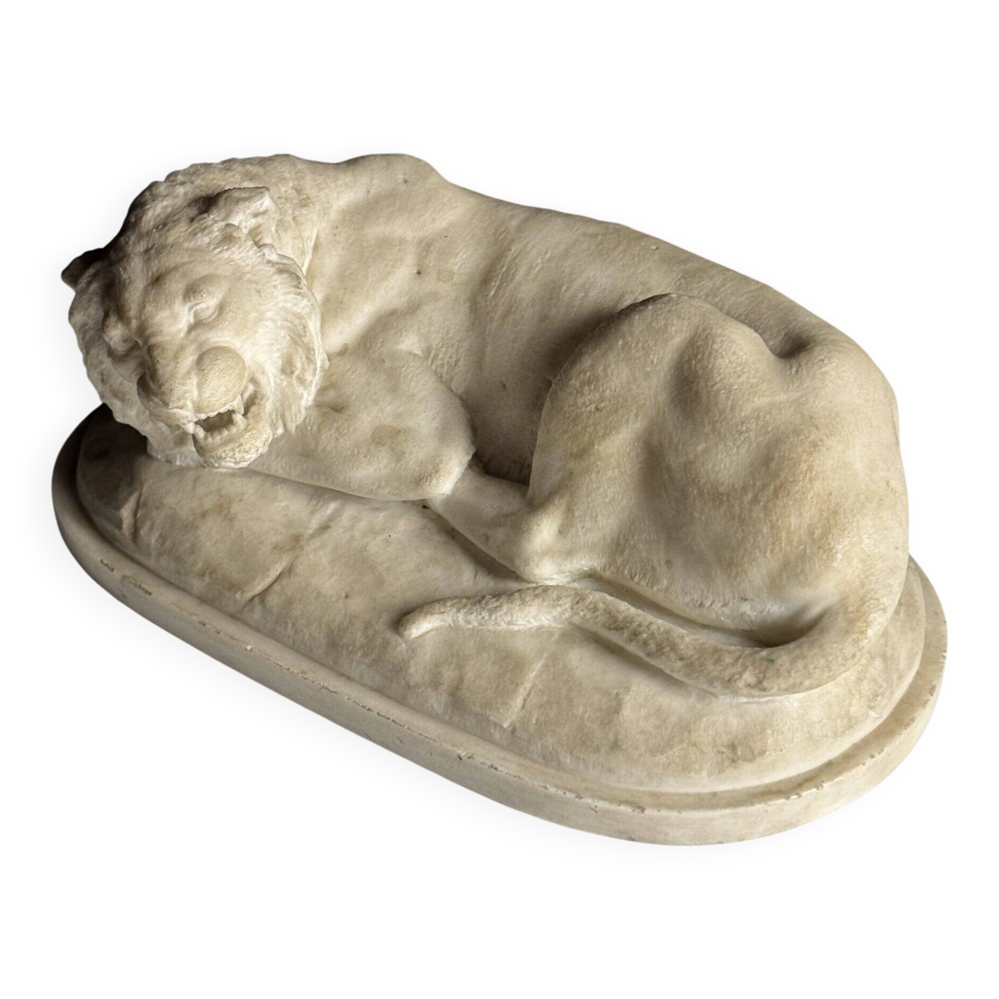 Marble sculpture of a reclining lion