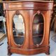 Curved display cabinet from the Napoleon III era in mahogany, circa 1850.
