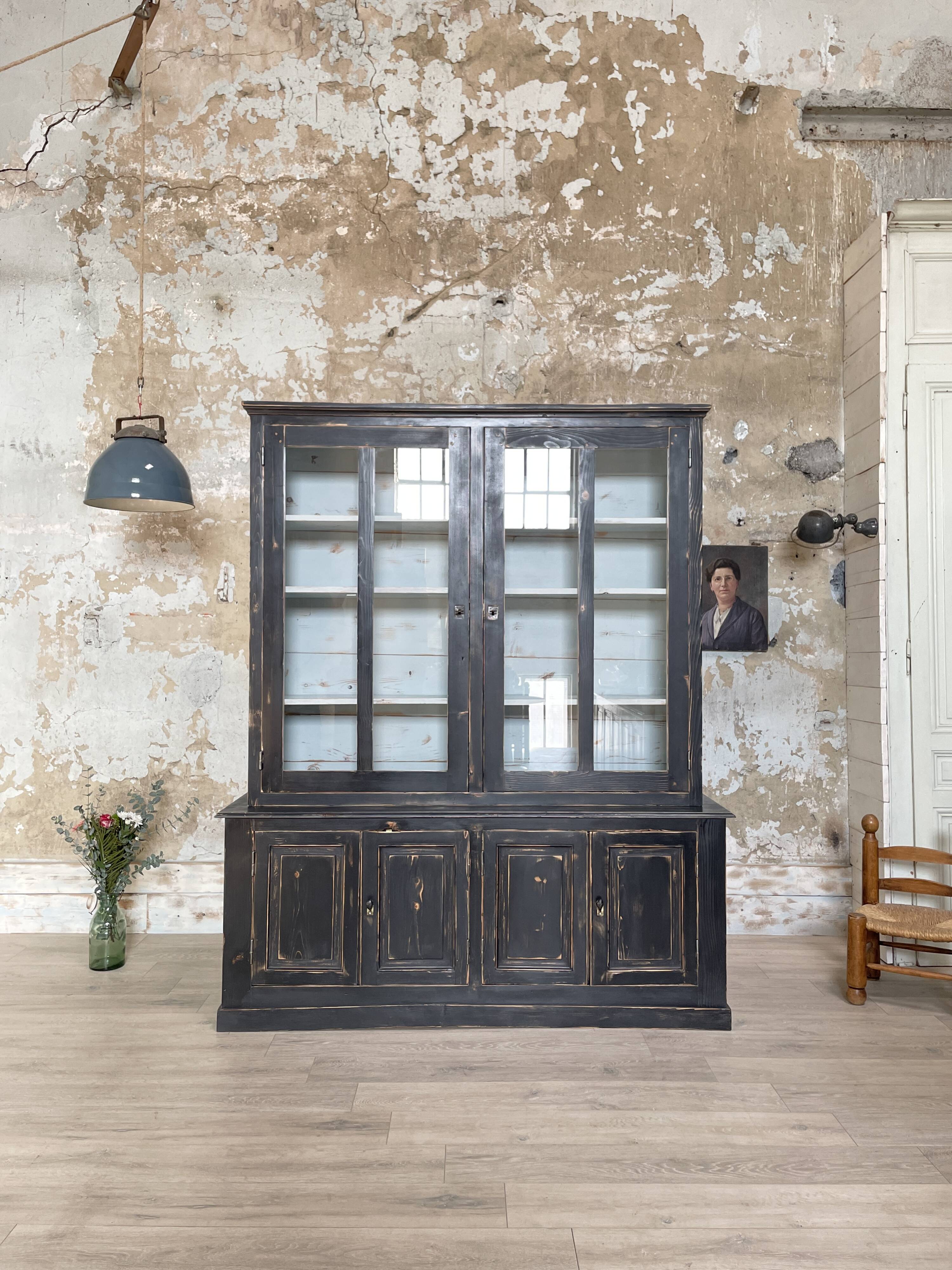 Display cabinet in patinated wood