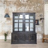 Display cabinet in patinated wood