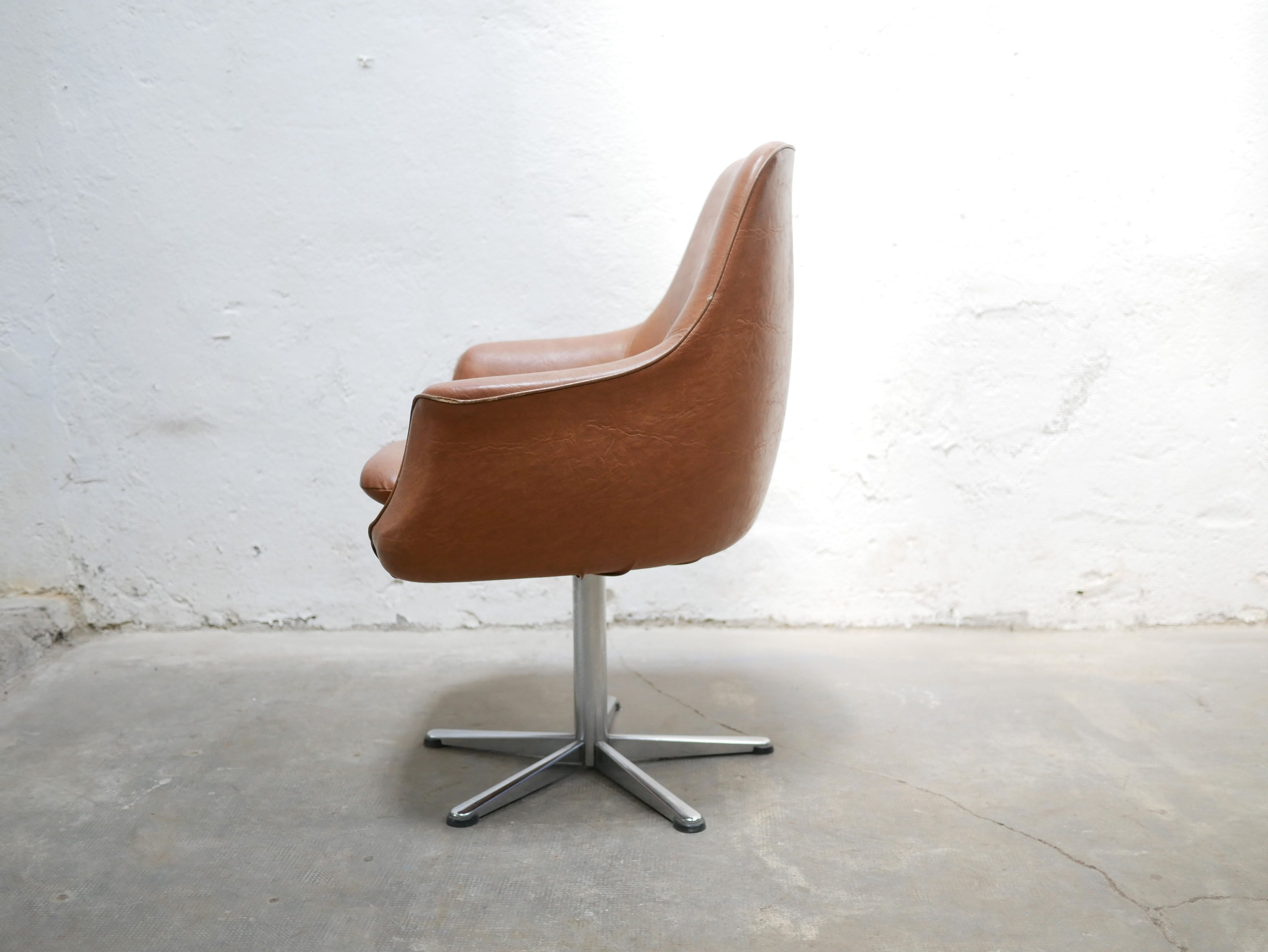Vintage swivel desk chair in imitation leather