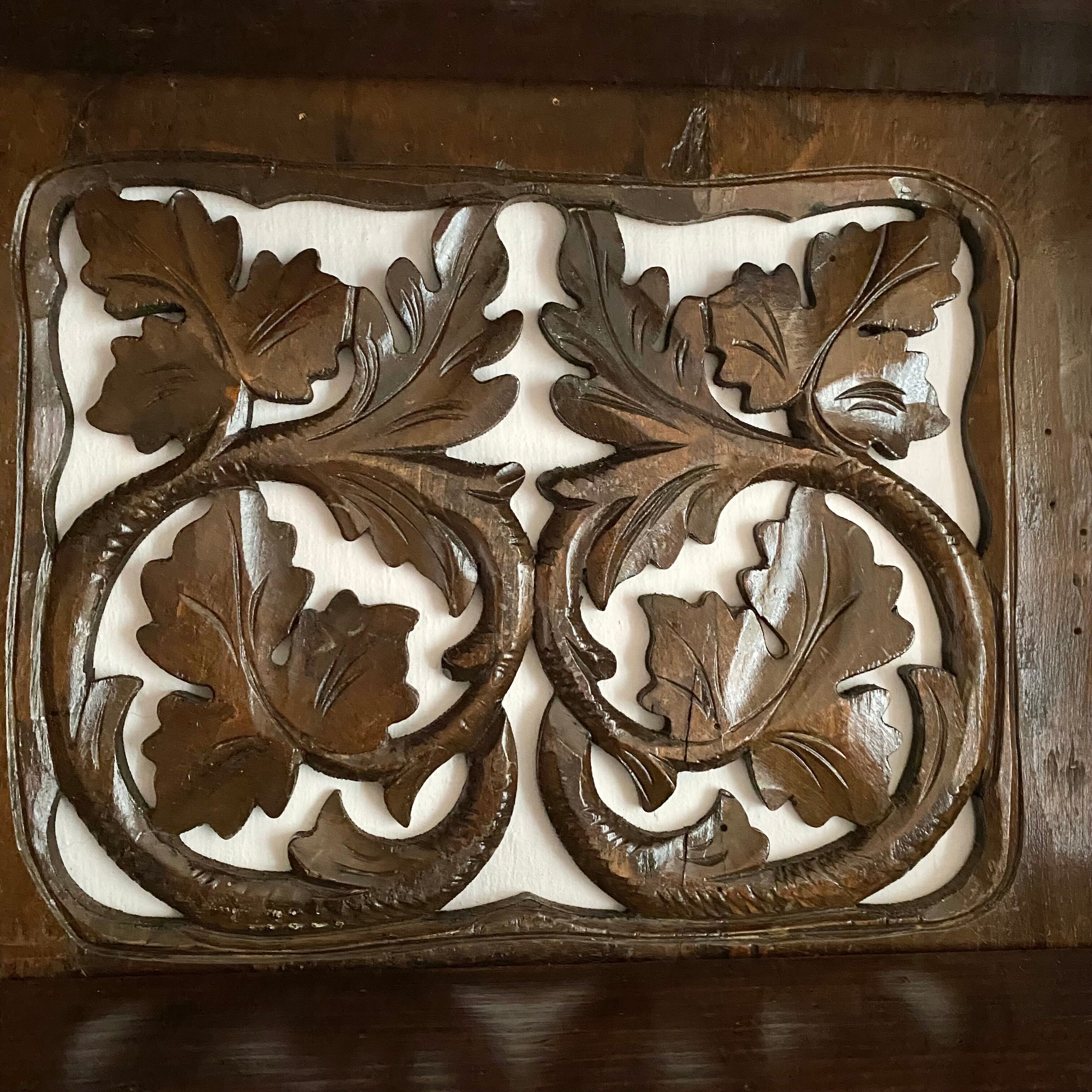 Carved wooden wall shelf