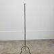 1950s tripod floor lamp, brass and black metal