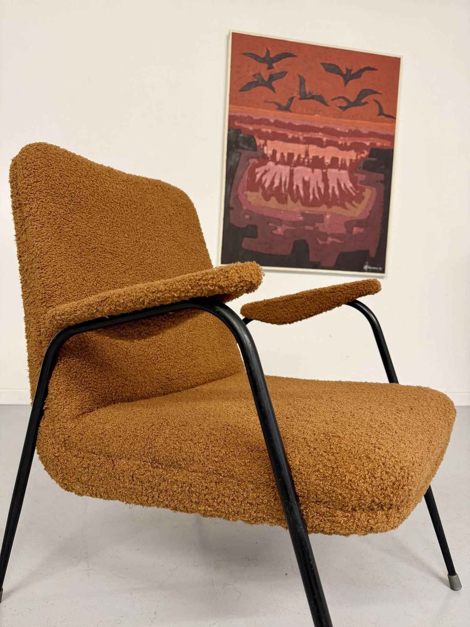 Vintage metal armchair with orange boucle fabric, French design from the 1950s.