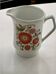 Milk jug 1970 floral pattern orange decor Laura