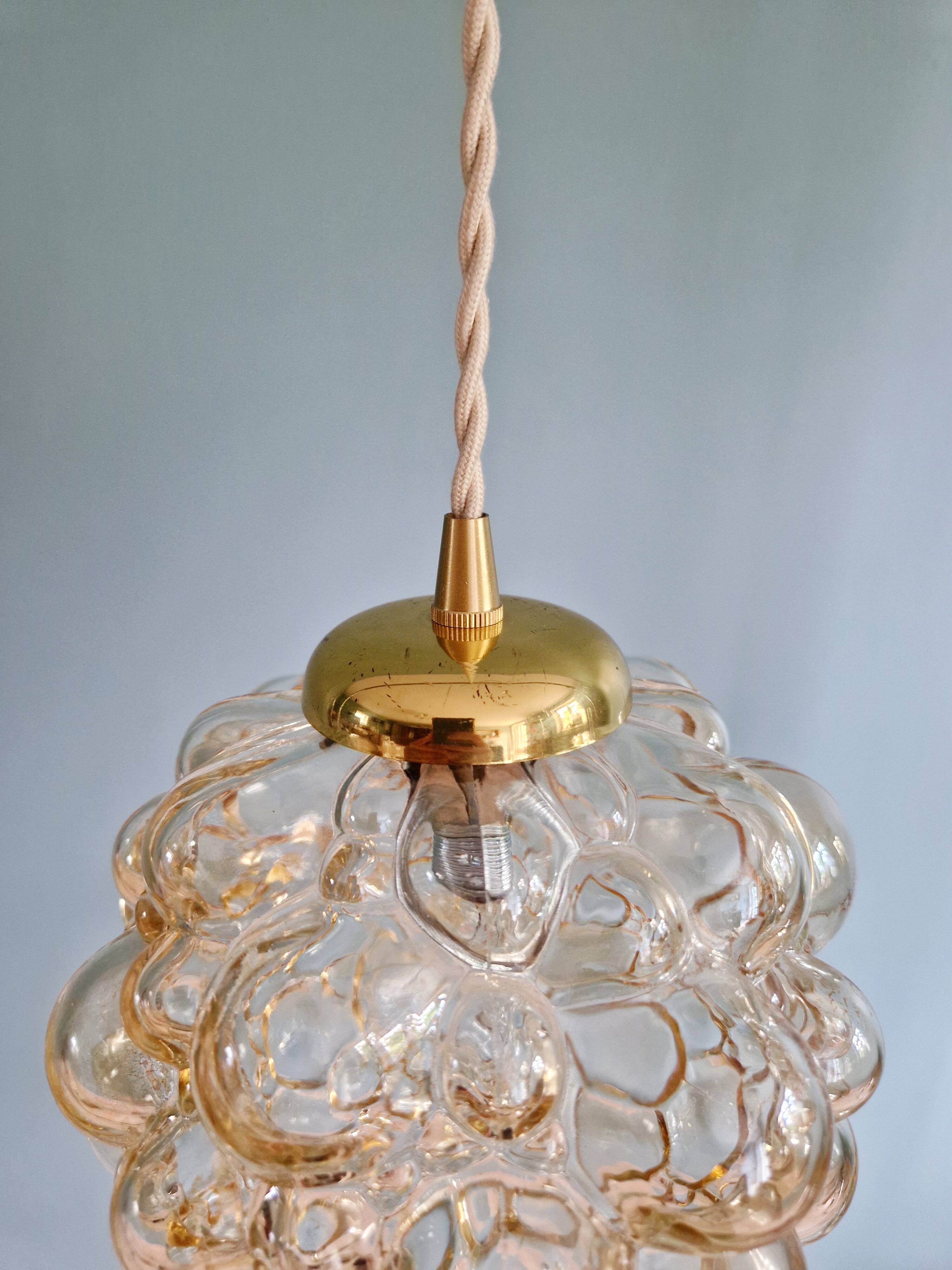 Amber bubble glass pendant (3 available), design by Helena Tynell, 1970.