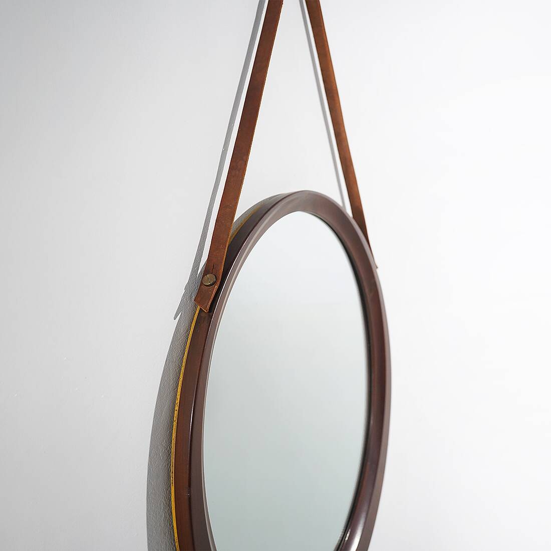 Round wall mirror with leather strap, 1960s