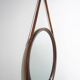 Round wall mirror with leather strap, 1960s