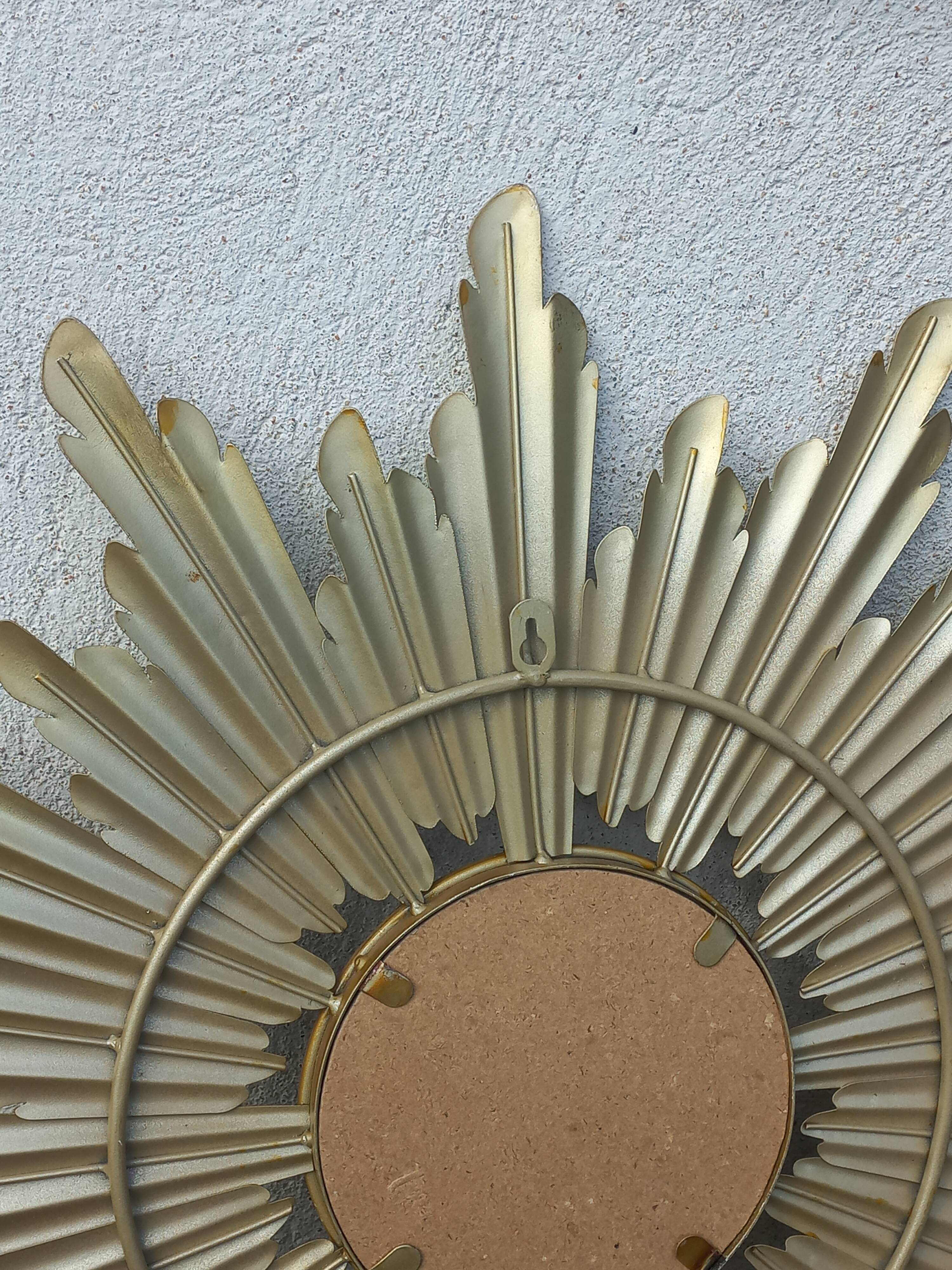 Gold metal sun mirror