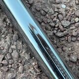 Wooden chair with caning in the style of Marcel Breuer.