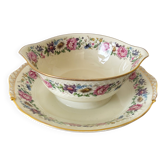 Limoges Bernardaud. Sauce boat in porcelain with floral decorations.