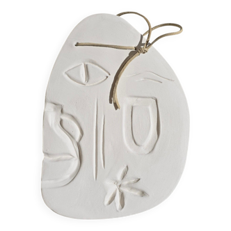 Mediterranean sculpted plaque