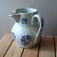 Large antique cruet in Saint Uze earthenware with blue flowers.