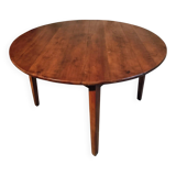 Vintage French round dining table in cherry wood, circa 1920.