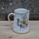 Decorated earthenware pitcher – signed Duncan Marais