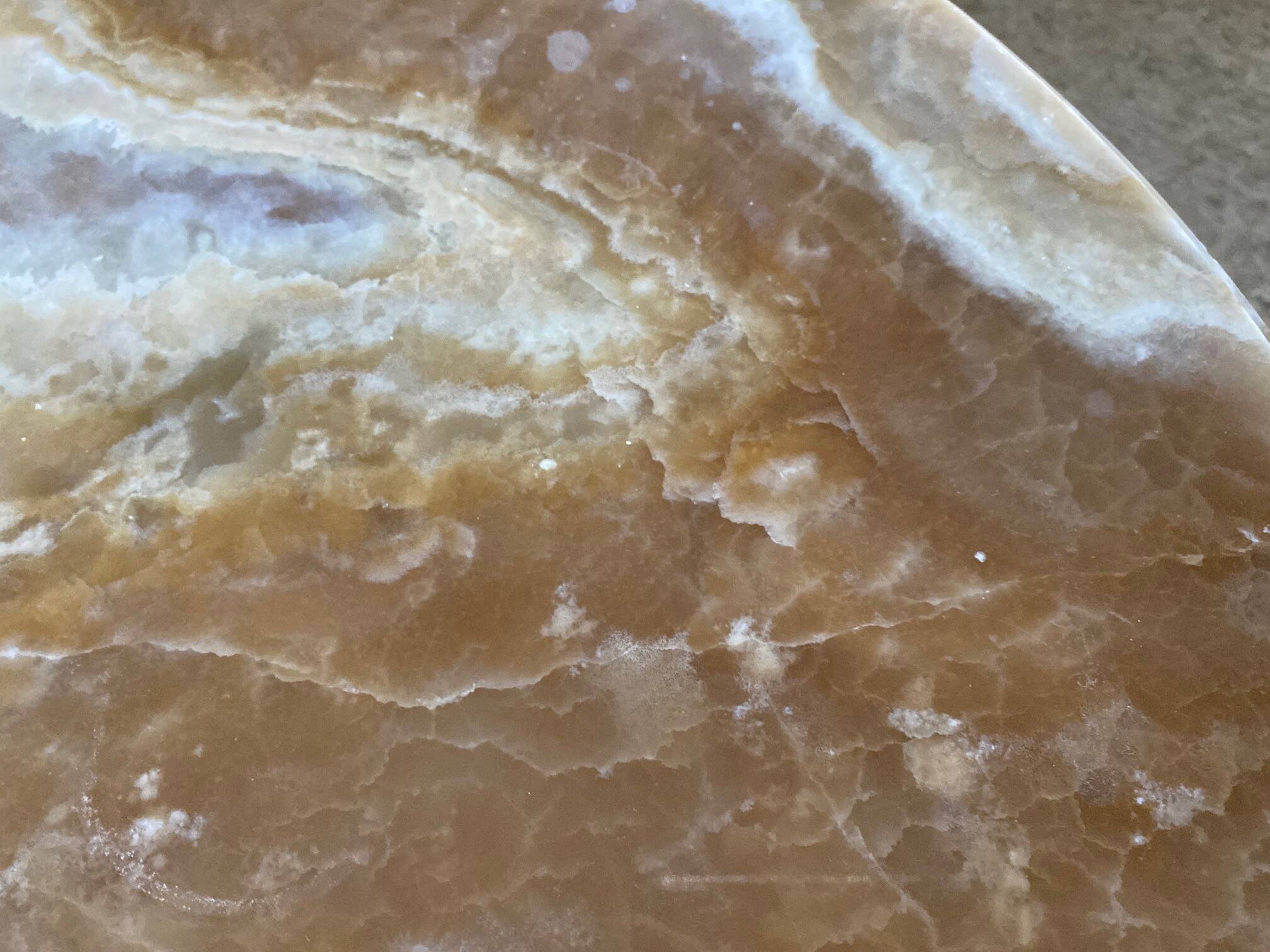 Vintage 1950s round onyx coffee table with brass base