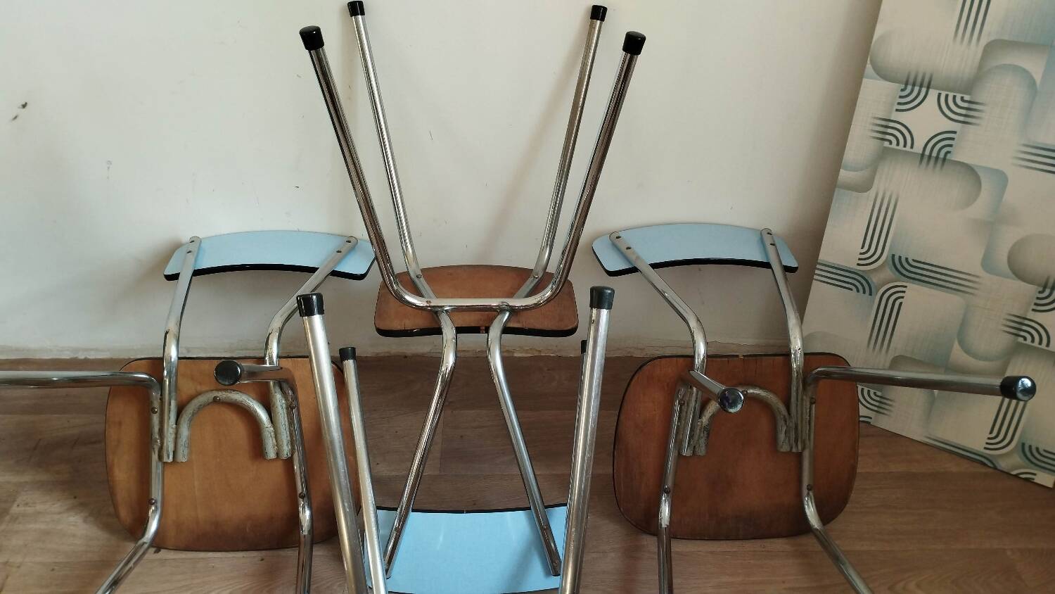 4 blue Formica chairs