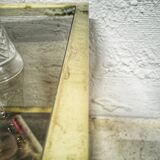 Golden side table and smoked glass