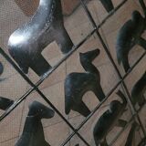 Pare-feu en métal noir décoré d'animaux