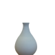White ceramic with dolphin motif