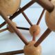 Sculptural modeling of a solid wood atom contemporary design