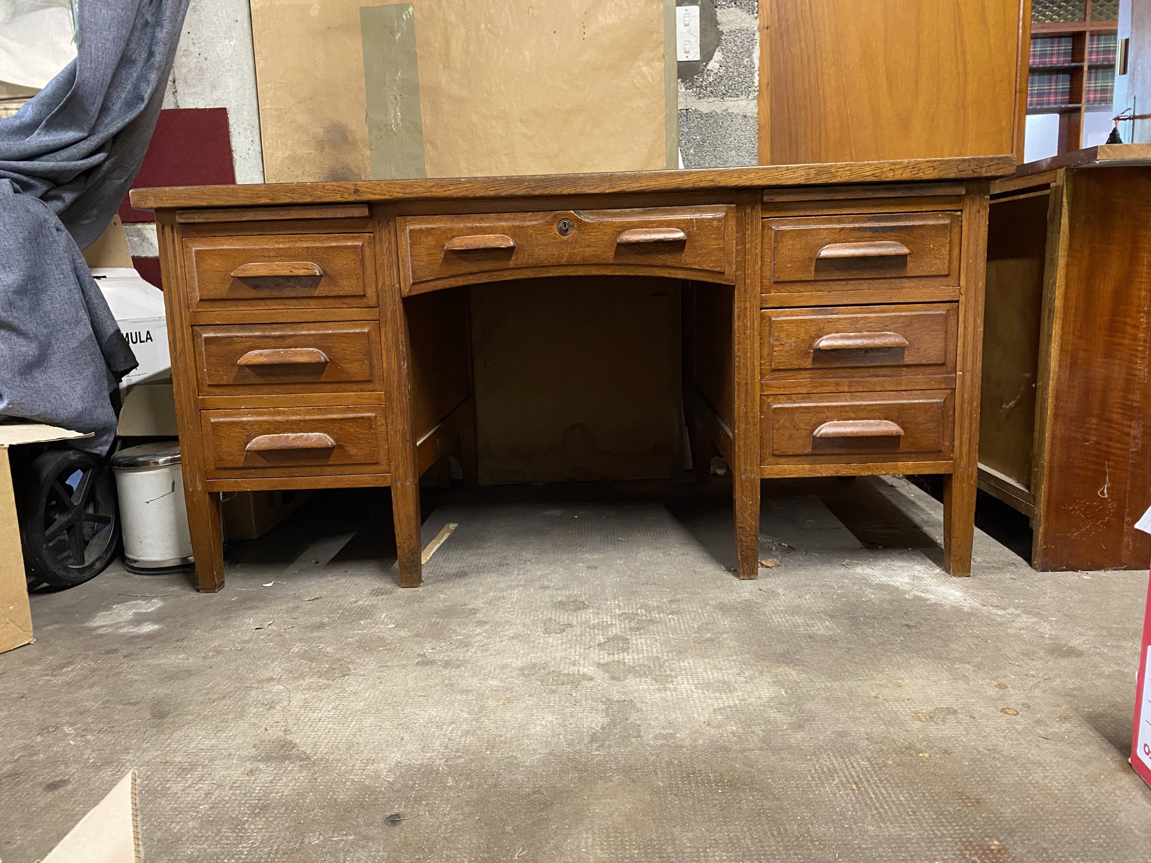 Teacher's desk from the 1950s on legs.