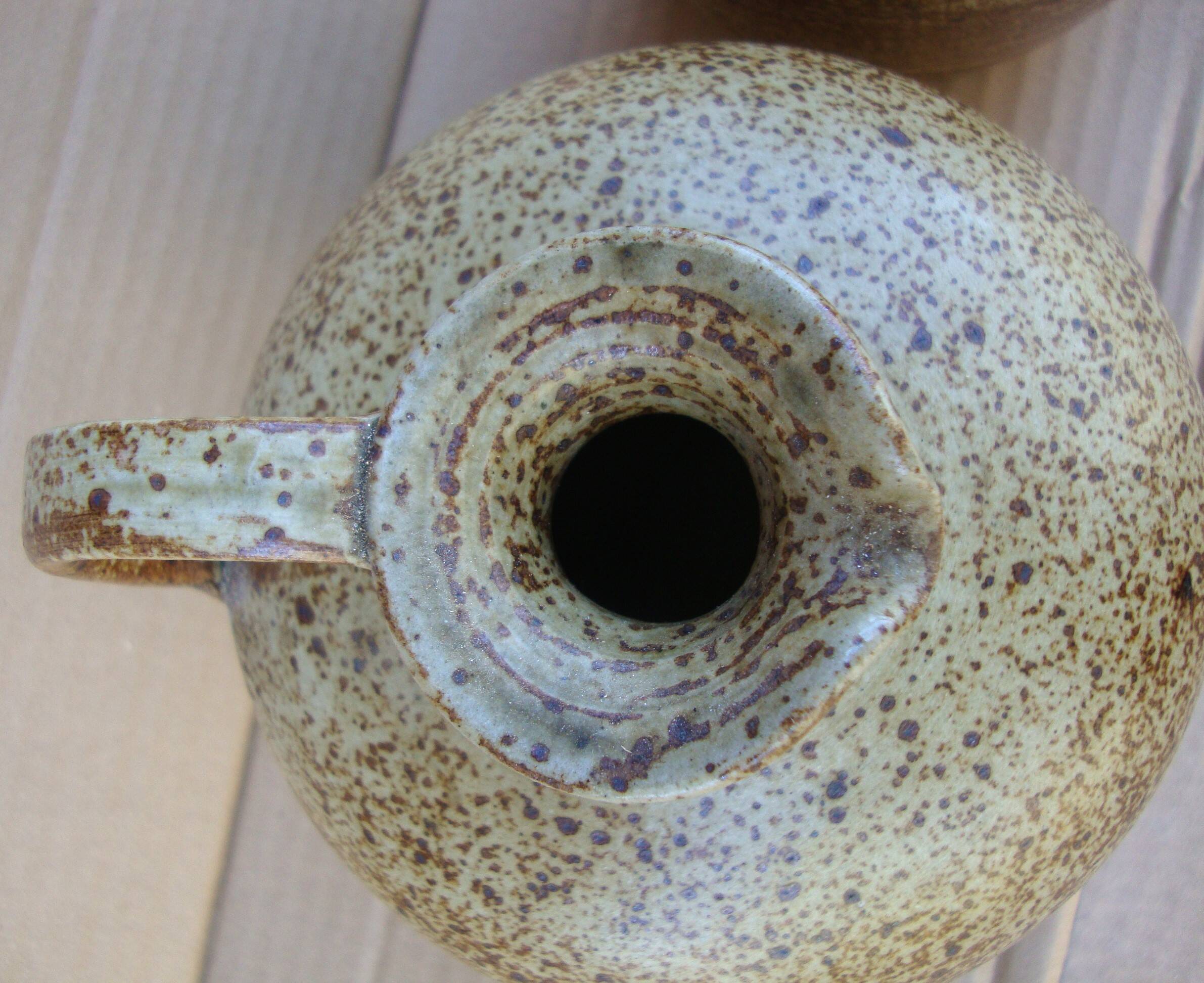 Pair of small antique stoneware oil jars