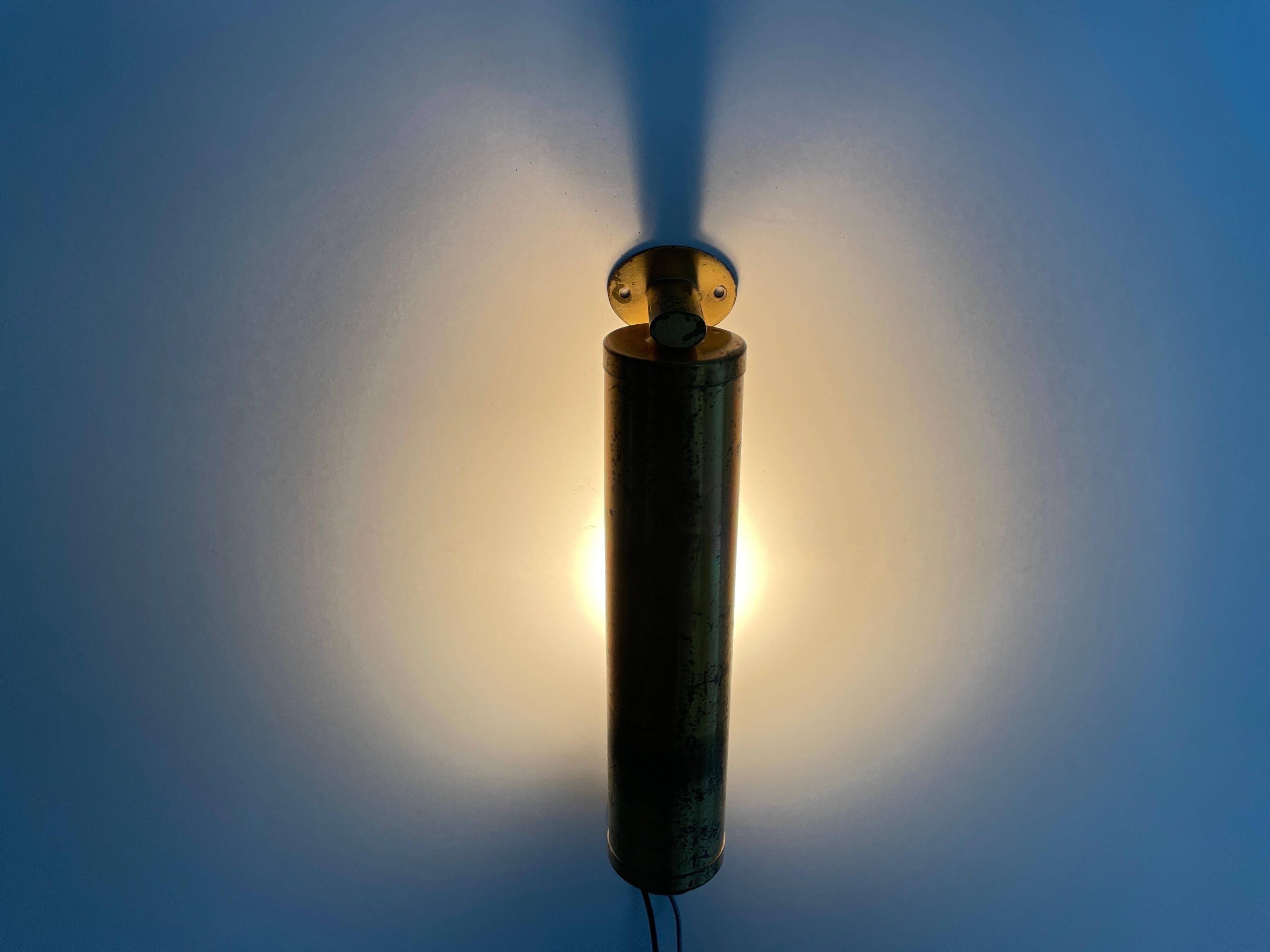 Small simple cylindrical brass wall light from the mid-century, 1950s, Germany.