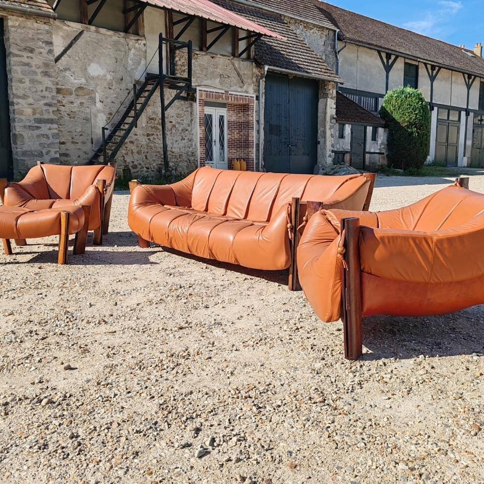 Percival lafer mp-211 sofa set with two armchairs and an ottoman in leather.