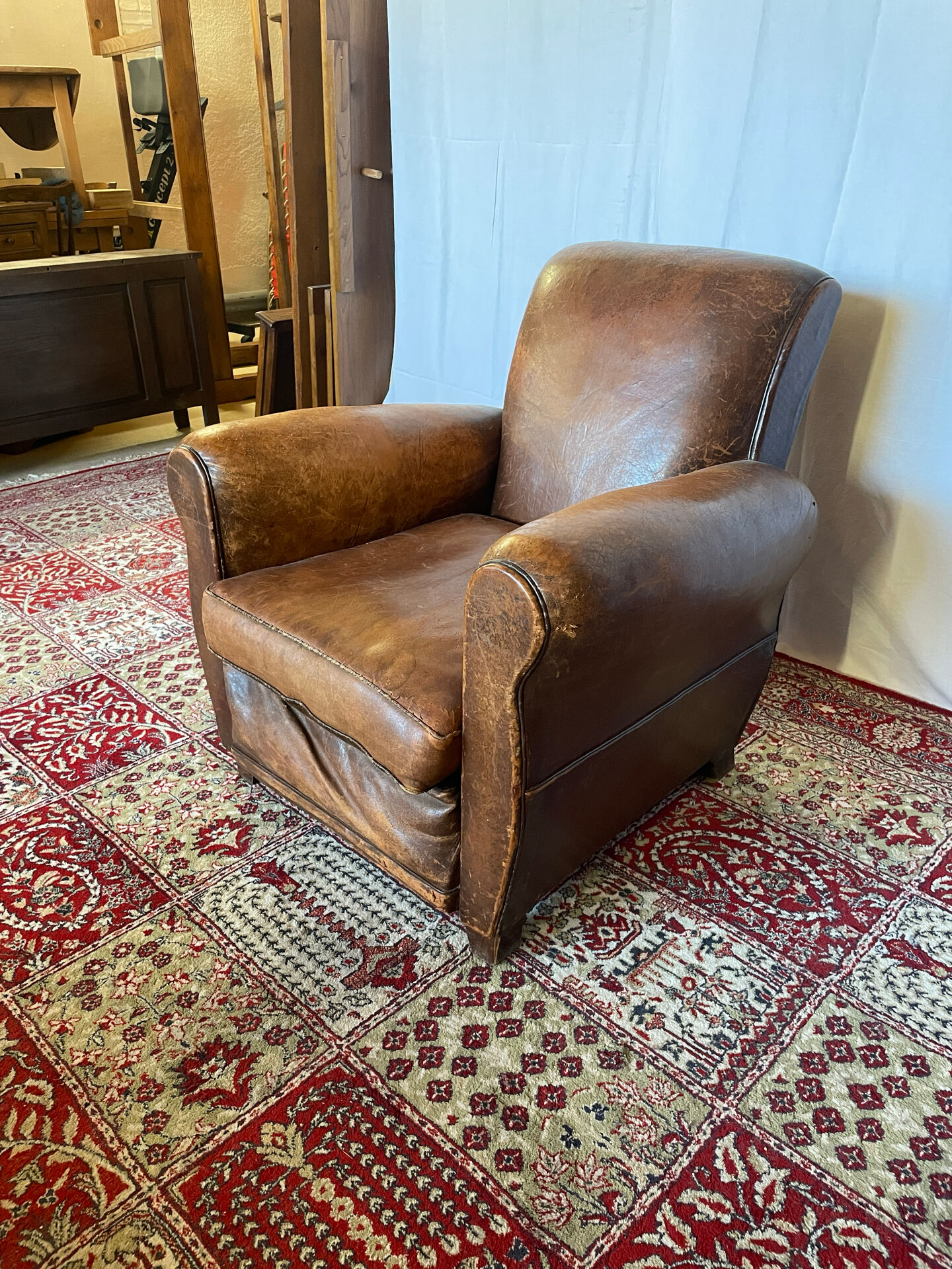 Vintage club armchair in cowhide leather