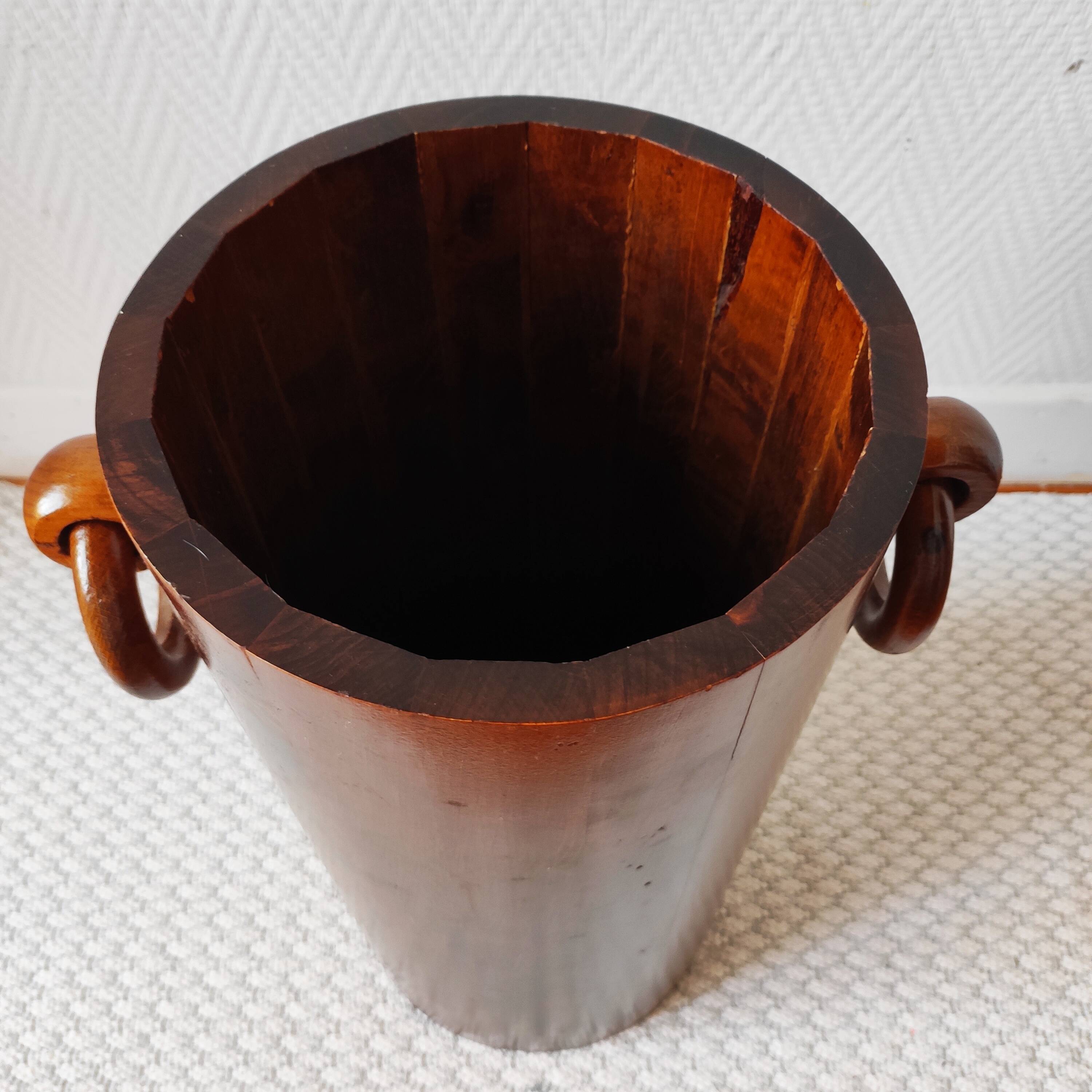 Brutalist sculptural wooden umbrella stand from the 1970s.