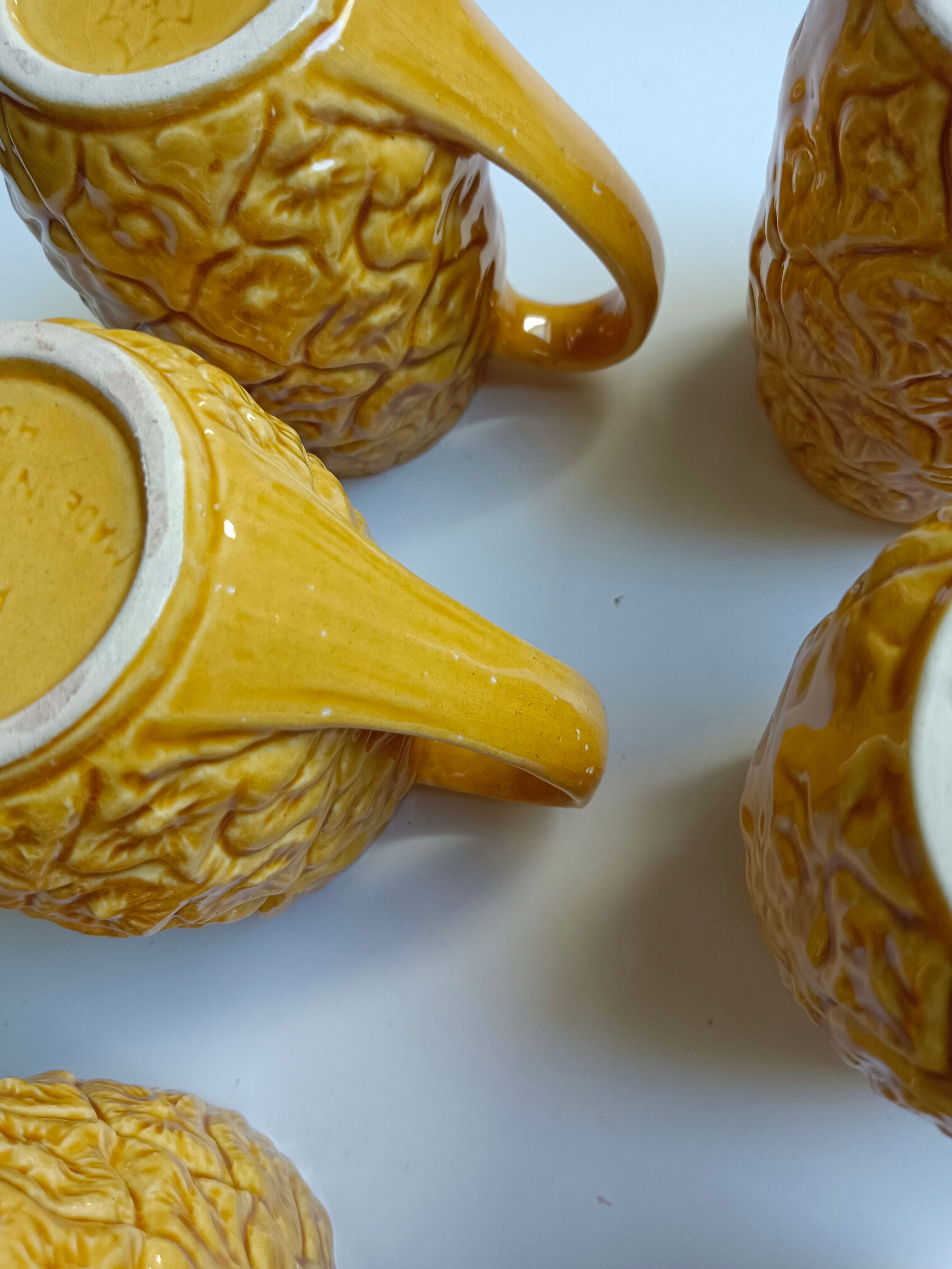 Handmade yellow pineapple mugs signed Kerangol made in Portugal.