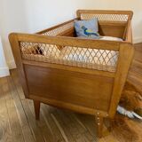 Wooden and wicker baby bed