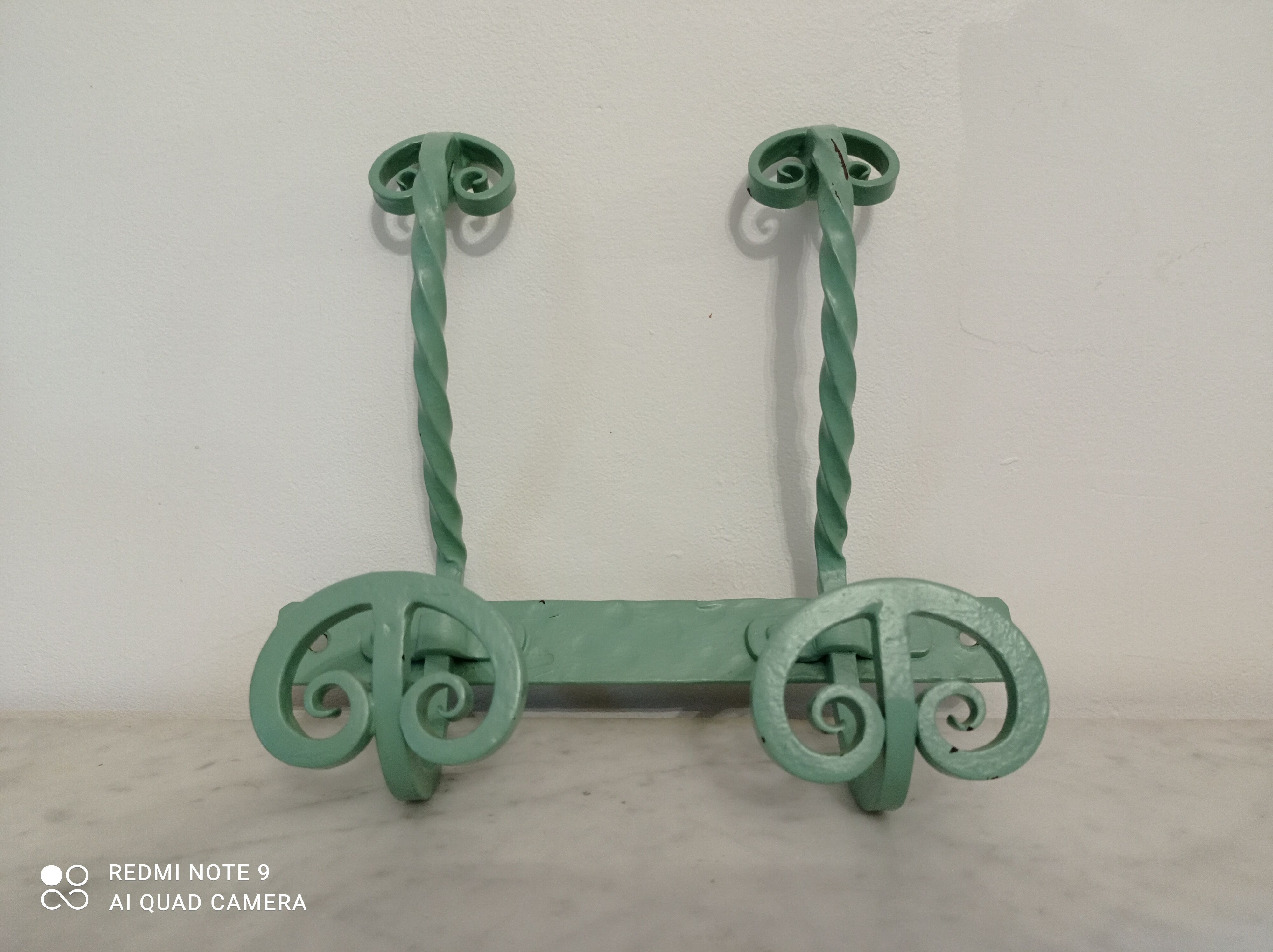 Double wrought iron coat hooks