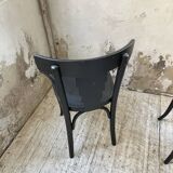 Set of 7 black bistro chairs